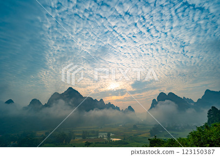 Beautiful sunrise landscape in Phong Nam valley, Amazing scenery landscape at Cao bang province, Northern Vietnam,Travel and nature landscape concept Beautiful sunrise landscape in Phong Nam valley, Amazing scenery landscape at Cao bang province, Northern Vietnam,Travel and nature landscape concept 123150387