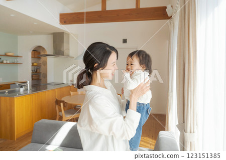Mother holding a baby 123151385