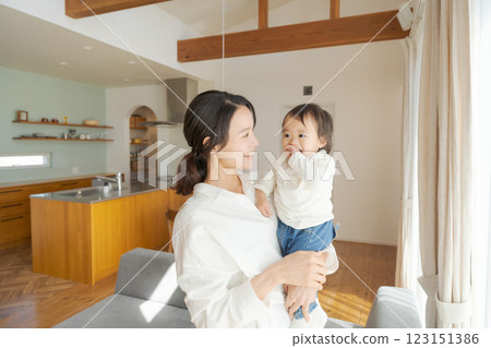 Mother holding a baby 123151386