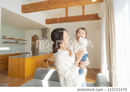 Mother holding a baby 123151478