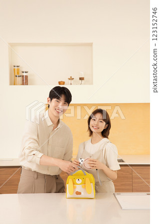 A couple preparing supplies for their dog 123152746