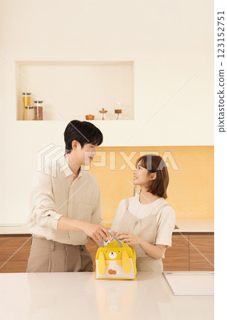 A couple preparing supplies for their dog 123152751