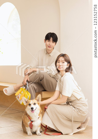 A happy couple with their dog 123152758