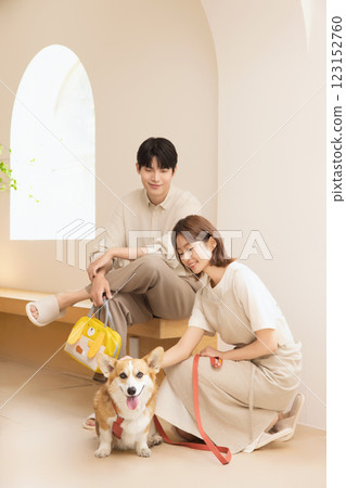 A happy couple with their dog 123152760