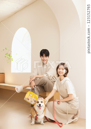 A happy couple with their dog A happy couple with their dog 123152765
