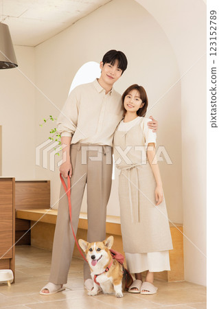 A happy couple with their dog 123152789