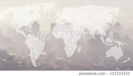 World map image over cityscape with tall buildings and hazy sky 123153252