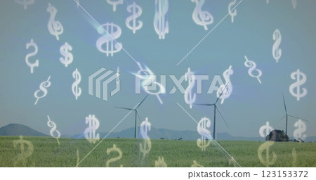 Dollar signs image over wind turbines in green field Dollar signs image over wind turbines in green field 123153372
