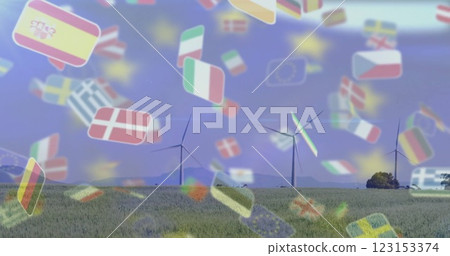 Wind turbines in field with European flags image over blue sky background 123153374