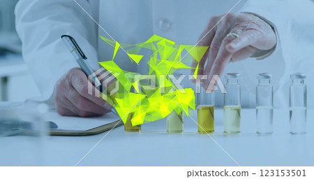 Image of glowing light trails over caucasian male scientist in laboratory Image of glowing light trails over caucasian male scientist in laboratory 123153501