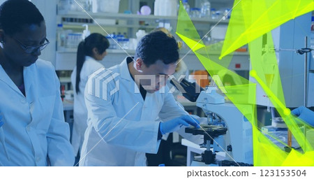 Image of glowing light trails over diverse scientists in laboratory Image of glowing light trails over diverse scientists in laboratory 123153504