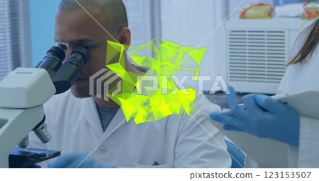 Image of glowing light trails over diverse scientists in laboratory Image of glowing light trails over diverse scientists in laboratory 123153507