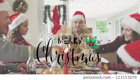 Image of merry christmas text over caucasian family having dinner 123153870