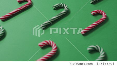 Image of merry christmas text over candy canes Image of merry christmas text over candy canes 123153891