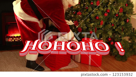 Image of hohoho text over santa claus with presents Image of hohoho text over santa claus with presents 123153932