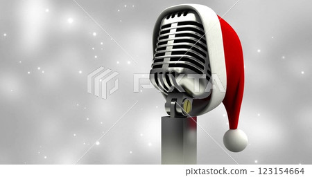 Image of microphone with santa hat over white spots 123154664
