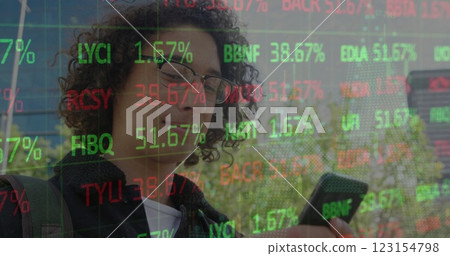 Image of young biracial man checks stock market updates on his phone 123154798