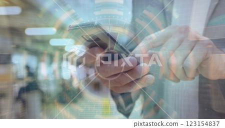 Image of financial data processing over caucasian businessman using smartphone 123154837