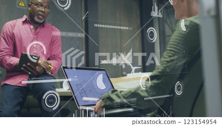 Image of financial data processing over diverse business people in office Image of financial data processing over diverse business people in office 123154954