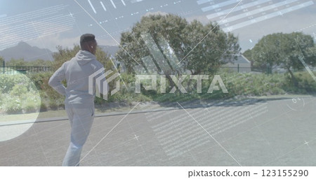Image of diagrams and data processing over african american man running in park 123155290