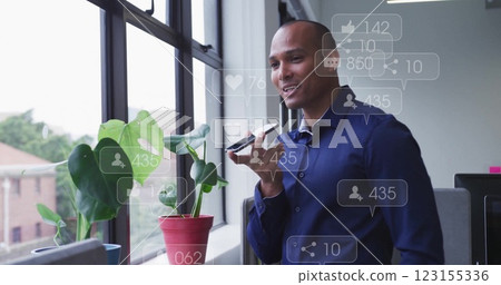 Image of data processing over biracial businessman talking on smartphone in office 123155336