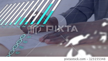 Image of financial data processing over african american businessman writing 123155348