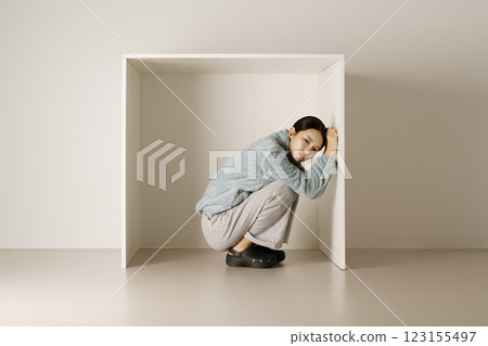 A frustrated student in a box 123155497