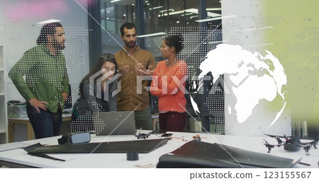 Image of world map and globe over diverse colleagues discussing work in office 123155567