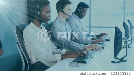 Image of network of connections with icons over diverse business people in office Image of network of connections with icons over diverse business people in office 123155582