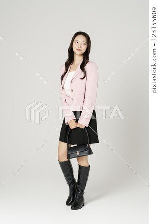 MZ employee in his 20s wearing a casual suit to work 123155609