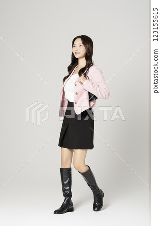 MZ employee in his 20s wearing a casual suit to work 123155615