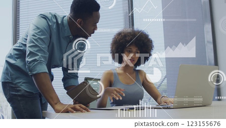 Image of icons and data processing over diverse business people in office Image of icons and data processing over diverse business people in office 123155676