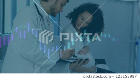 Doctor consulting pregnant woman with financial data image over medical setting 123155987