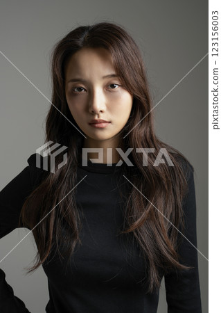 A woman in her 20s exhausted from depression A woman in her 20s exhausted from depression 123156003