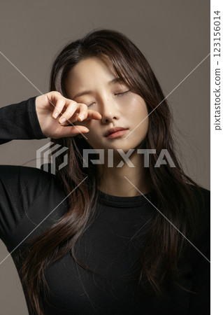 A woman in her 20s exhausted from depression 123156014