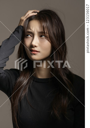 A woman in her 20s exhausted from depression 123156017