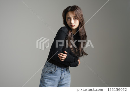 A woman in her 20s avoiding people due to depression 123156052