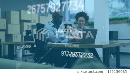 Business professionals discussing over laptop with floating numbers image 123156085