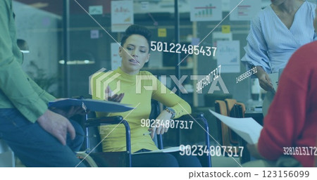 Business meeting with numerical data processing image over diverse team in office 123156099