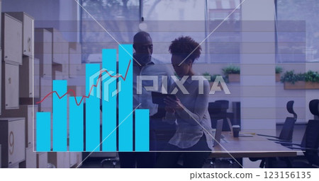 Bar and line graph image over diverse business people discussing in office 123156135