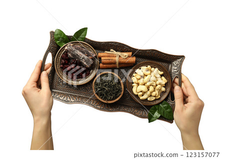 PNG, Ramadan. Female hands holding tray with traditional Ramadan food, isolated on white background. PNG, Ramadan. Female hands holding tray with traditional Ramadan food, isolated on white background. 123157077