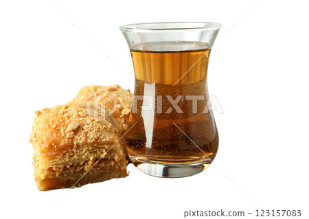 PNG, Ramadan. Baklava in a plate with a glass of tea,isolated on a white background. PNG, Ramadan. Baklava in a plate with a glass of tea,isolated on a white background. 123157083