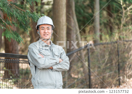 Forestry / Environmental protection / Men in work clothes at construction sites Forestry / Environmental protection / Men in work clothes at construction sites 123157732