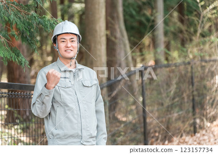 Forestry / Environmental protection / Men in work clothes at construction sites Forestry / Environmental protection / Men in work clothes at construction sites 123157734