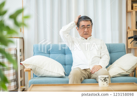 Senior man suffering from headache 123158098