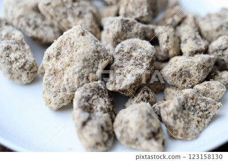 Solid brown sugar from Tarama Island, Okinawa 123158130