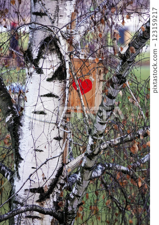 Birdhouse with painted red heart Birdhouse with painted red heart 123159217