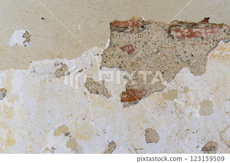 Close-up view of old damaged plaster. Abstract background for various uses. 123159509