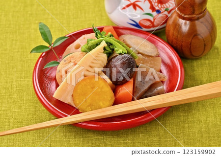 Boiled vegetables, bamboo shoots, rape blossoms, lotus root, shiitake mushrooms, carrots, burdock, radish, konnyaku, ganmodoki, and simmered dishes. Boiled vegetables, bamboo shoots, rape blossoms, lotus root, shiitake mushrooms, carrots, burdock, radish, konnyaku, ganmodoki, and simmered dishes. 123159902