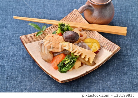 Boiled vegetables, bamboo shoots, rape blossoms, lotus root, shiitake mushrooms, carrots, burdock, radish, konnyaku, ganmodoki, and simmered dishes. Boiled vegetables, bamboo shoots, rape blossoms, lotus root, shiitake mushrooms, carrots, burdock, radish, konnyaku, ganmodoki, and simmered dishes. 123159935
